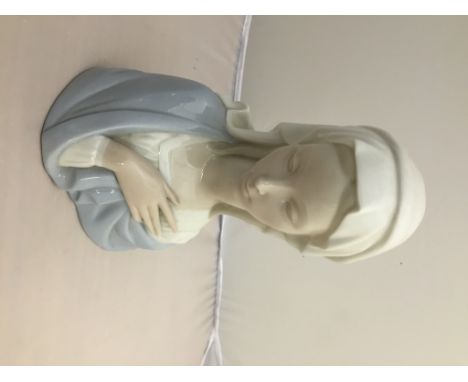 A Lladro head of The Madonna