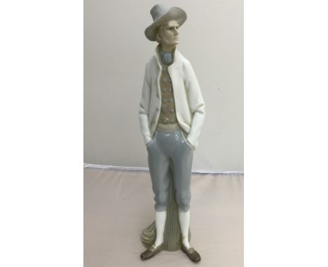 A Lladro figure of a man