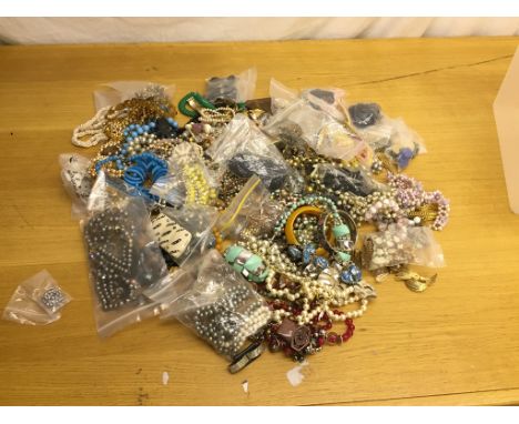 A box of vintage dress jewellery
