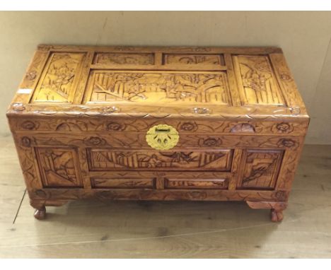 A carved Oriental trunk