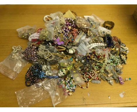 A box of vintage dress jewellery