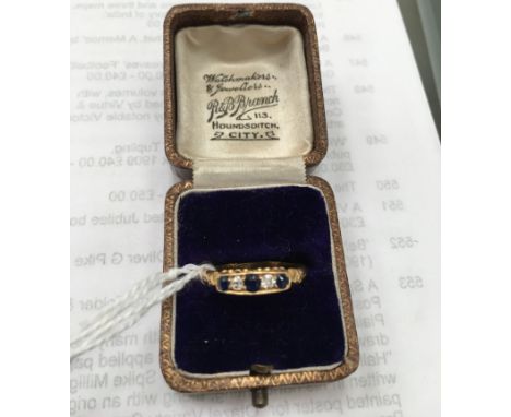 An 18ct diamond and sapphire ring