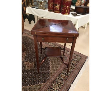 A 19th century mahogany envelope card table