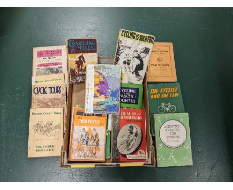 An assorted collection of vintage cycling books, including 'Cycling in the Lake District' by John Crowe, 'Cycling in the Nort