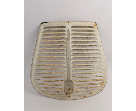 A cream painted vintage car grill, measuring 30cm by 42cm, and a bike motor