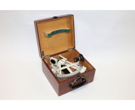 A vintage cased Freiberger yacht sextant, nr. 100885, case dimensions 24.5cm by 27cm by 15.5cm