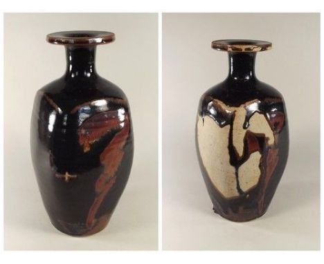 DAVID LEACH.
A David Leach vase. Impressed personal mark. Significant glaze crawl. Height 34cm. CONDITION REPORTS: No damage,