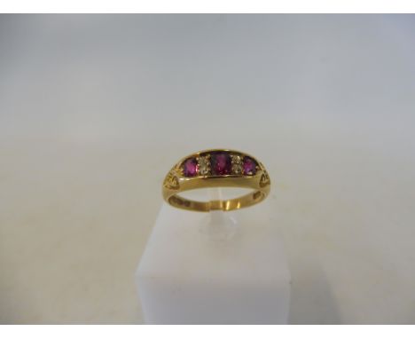 A cased 18ct gold ruby and diamond ring, Chester 1898, size P/Q, 4.9g.