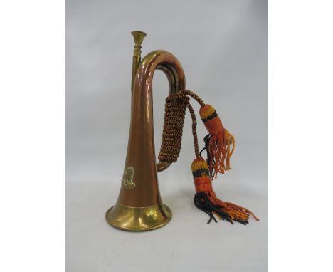 A military copper and brass mounted bugle.