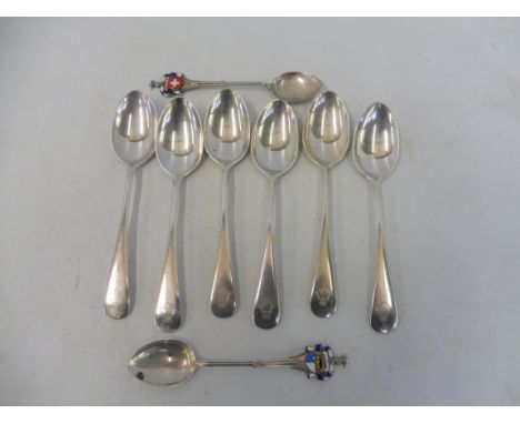 A set of six silver teaspoons from HMS Thane (aircraft carrier) plus two others with enamel ends.