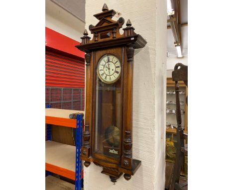 A late 19th/early 20th Century Vienna type regulator, with circular enamel dial.