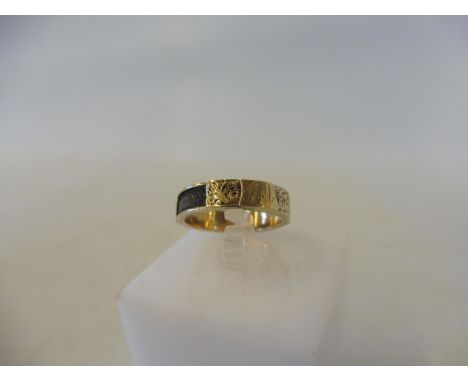 A cased gold mourning ring, size K/L, 1.5g.