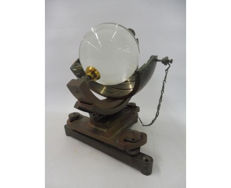 An unusual and good quality sunshine recorder for a tropical climate, by Casella of London, no. 8868, 8 3/4" h.