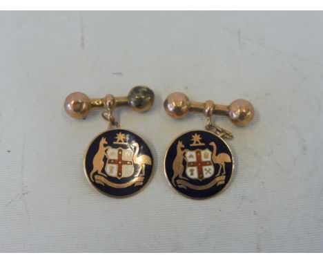 A pair of 9ct gold and enamel cufflinks, with a coat of arms flanked by a kangaroo and an emu or an ostrich, 5.8g.
