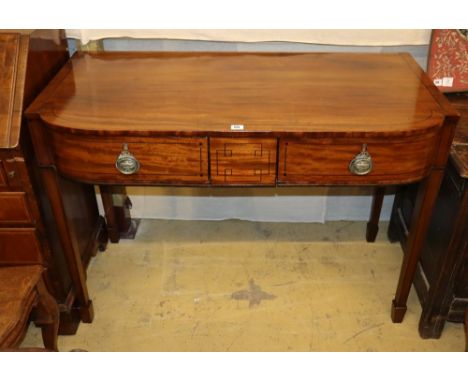 A Regency and later mahogany and ebony line inlaid three drawer bow fronted serving table, W.117cmCONDITION: Slight warping o