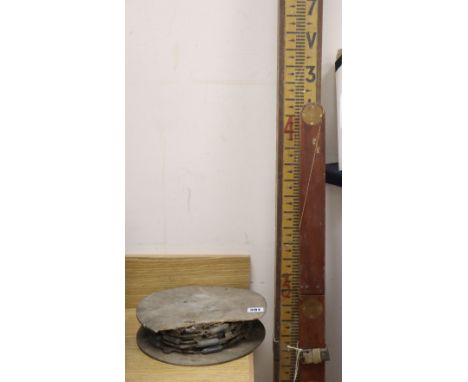 An early 20th century surveyors level rod and a yard stick and 22 yds chain