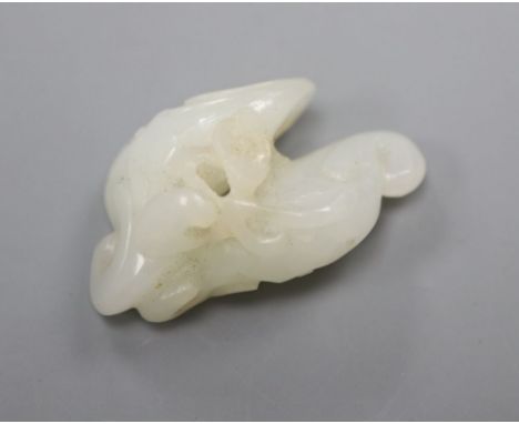 A Chinese carved white jade group of bats