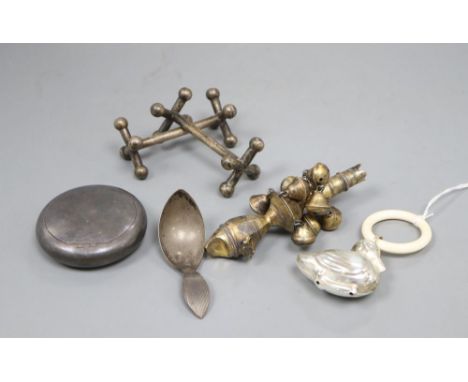 Mixed silver including a Georgian silver gilt child's rattle (lacking teether), a later rattle, a Dutch white metal caddy spo