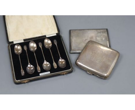 Two silver cigarette cases including engine turned and a cased set of six silver teaspoons.