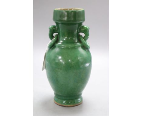 A Chinese green Langyao vase, c.1800, height 23cmCONDITION: There is a large split reaching from his right shoulder over his 