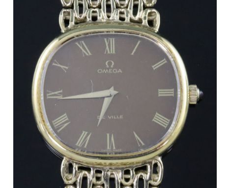 A gentleman's 1970's silver gilt Omega de Ville manual wind wristwatch, on Omega oval link bracelet, with brown Roman oval di