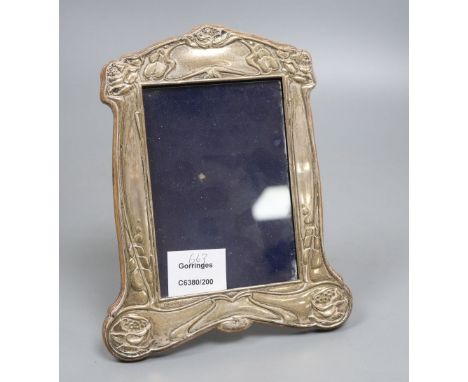 An Edwardian Art Nouveau silver mounted photograph frame, Birmingham, 1904, 21.5cm.