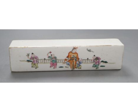 A Chinese famille rose scroll weight, length 21cm