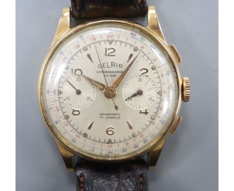 A gentleman's 18k Delrio chronograph manual wind wrist watch. case diameter 38mm, gross 45.9 grams.CONDITION: Not currently w