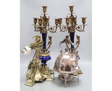 A pair of gilt metal and porcelain five light candelabra, height 50cm, a table lamp and a kettle on stand