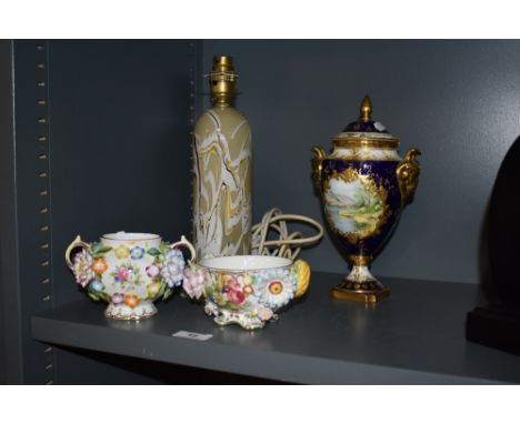 A 20th century Coalport urn having hand painted scene of Derwentwater by John Budd, two Coalbrookdale by Coalport bowls and a
