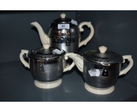 A vintage trio , including teapot, hot water pot and sugar basin, 'Heatmaster, Balmoral'.