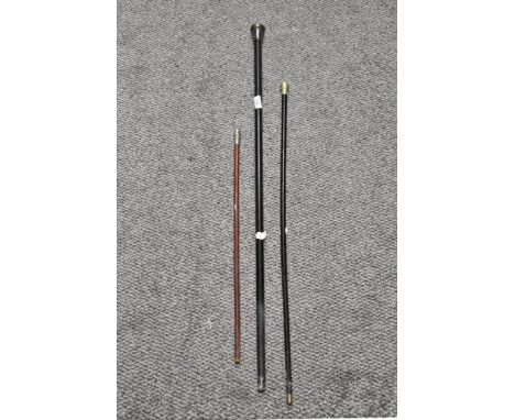 A 1920s ebonised walking cane with Birmingham silver knob, 91cm long, a Machine Gun Corps swagger stick of similar age, and a