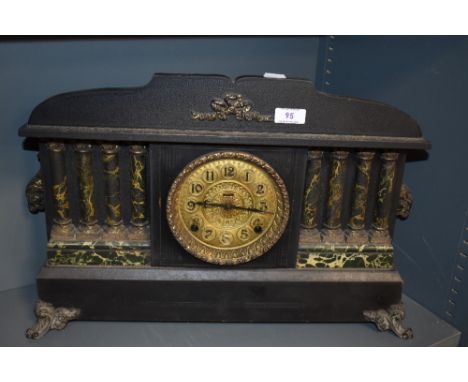 A 20th century reproduction Victorian style mantel clock, having architectural style.