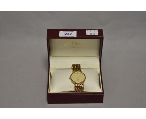 A gentleman's Rotary Artemis wristwatch, having a gold plated case and strap, with commemorative inscription to rear