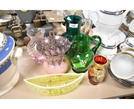 A selection of assorted glassware, to comprise a 19th/20th Century etched green glass jug, a Mary Gregory style jug, two glas