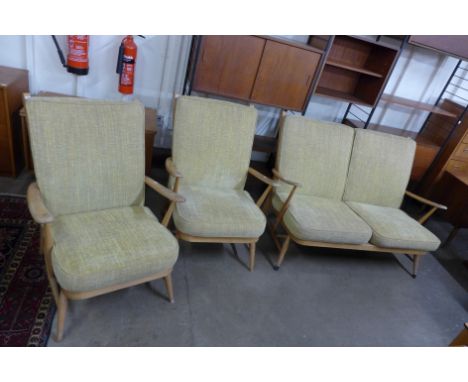 An Ercol Blonde elm and beech three piece suite 