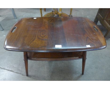 An Ercol Golden Dawn elm and beech 457 model butlers tray coffee table 