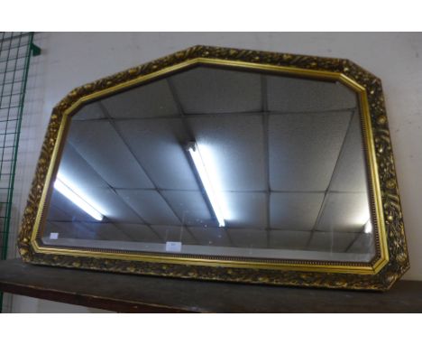 A gilt framed overmantle mirror 