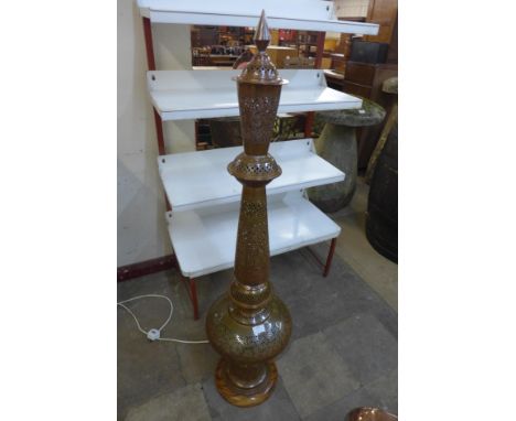 A Moorish copper floor standing lamp 