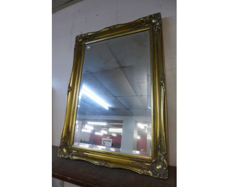 A gilt framed mirror 