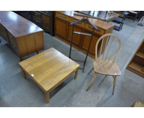 An Ercol Blonde elm coffee table, an Ercol chair and a beech gentleman's valet stand 