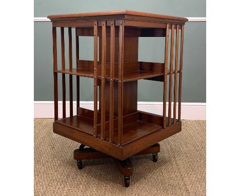 ANTIQUE MAHOGANY REVOLVING BOOKCASE, raised on cruciform base with ceramic castors, 92 (h) x 60cms (sq.)Provenance: private c