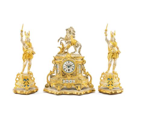 FRENCH SPELTER & PORCELAIN-MOUNTED CLOCK GARNITURE, c. 1900, of neo-rococo form, the mantel clock with Marley Horse surmount,