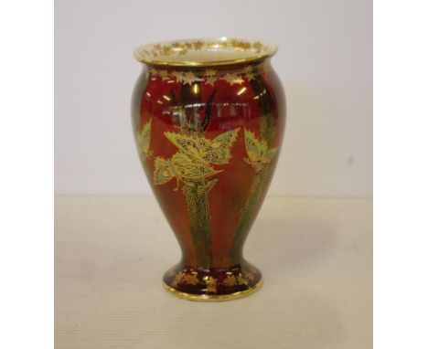 Art Deco Crown Devon `Fairyland` style vase enamelled with gilt and exotic butterflies on lustre burgundy ground, 16cm high