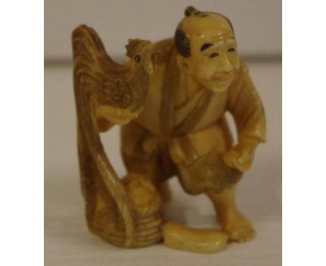 Japanese antique carved ivory netsuke, C:1920 Gentleman with a bird, signed to base, H5cm approx