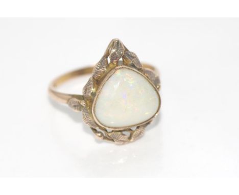 Vintage 9ct rose gold and solid white opal ring with floral design surrounding the opal, weight: approx 2.52 grams, size: N/6