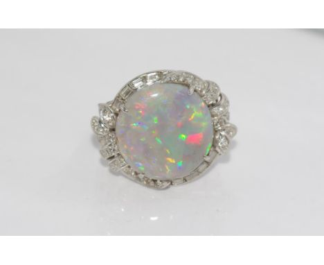 Platinum, solid opal and diamond ring weight: approx 8.86 grams, size: N/6-7