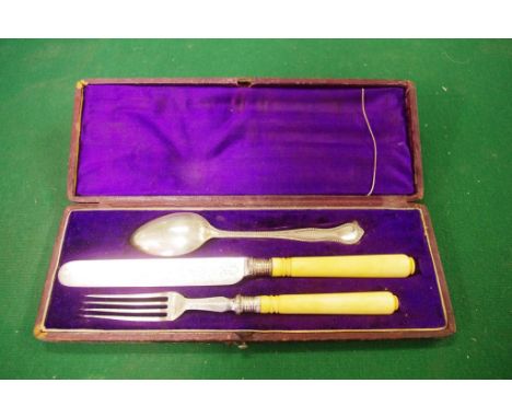 Boxed cutlery set with carved handles to knife and fork