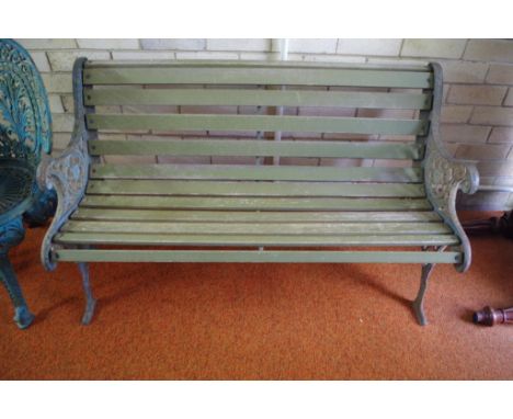 Cast iron and wood garden bench 128cm wide approx