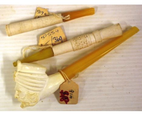 Vintage Man with turban Meerschaum pipe together with two vintage cigarette holders